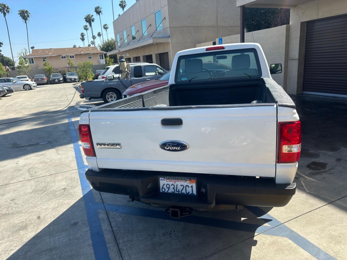 2011 WHITE /GRAY Ford Ranger XL 2WD (1FTKR1AE9BP) with an 4.0L V6 SOHC 12V engine, AUTOMATIC transmission, located at 30 S. Berkeley Avenue, Pasadena, CA, 91107, (626) 248-7567, 34.145447, -118.109398 - Body Style 2-Door REGULAR CAB PICKUP 2-DR Trim XL 2WD Engine 4.0L V6 SOHC 12V Other Transmission AUTOMATIC Drivetrain RWD Ext. Color WHITE Int. Color GRAY Stock Number 7662 VIN 1FTKR1AE9BPA78334 Location Crown City Motors Pasadena, CA WORK TRUCK!!! Crown City Motors is a use - Photo#3